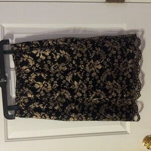 Ladies black lace and gold skirt